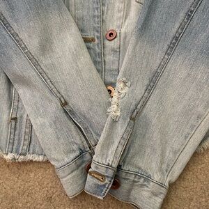 Jean jacket, light colored denim, distressed jean jacket